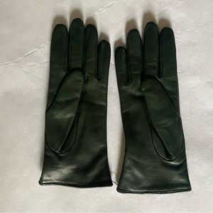Green leather and suede gloves, wool lining.